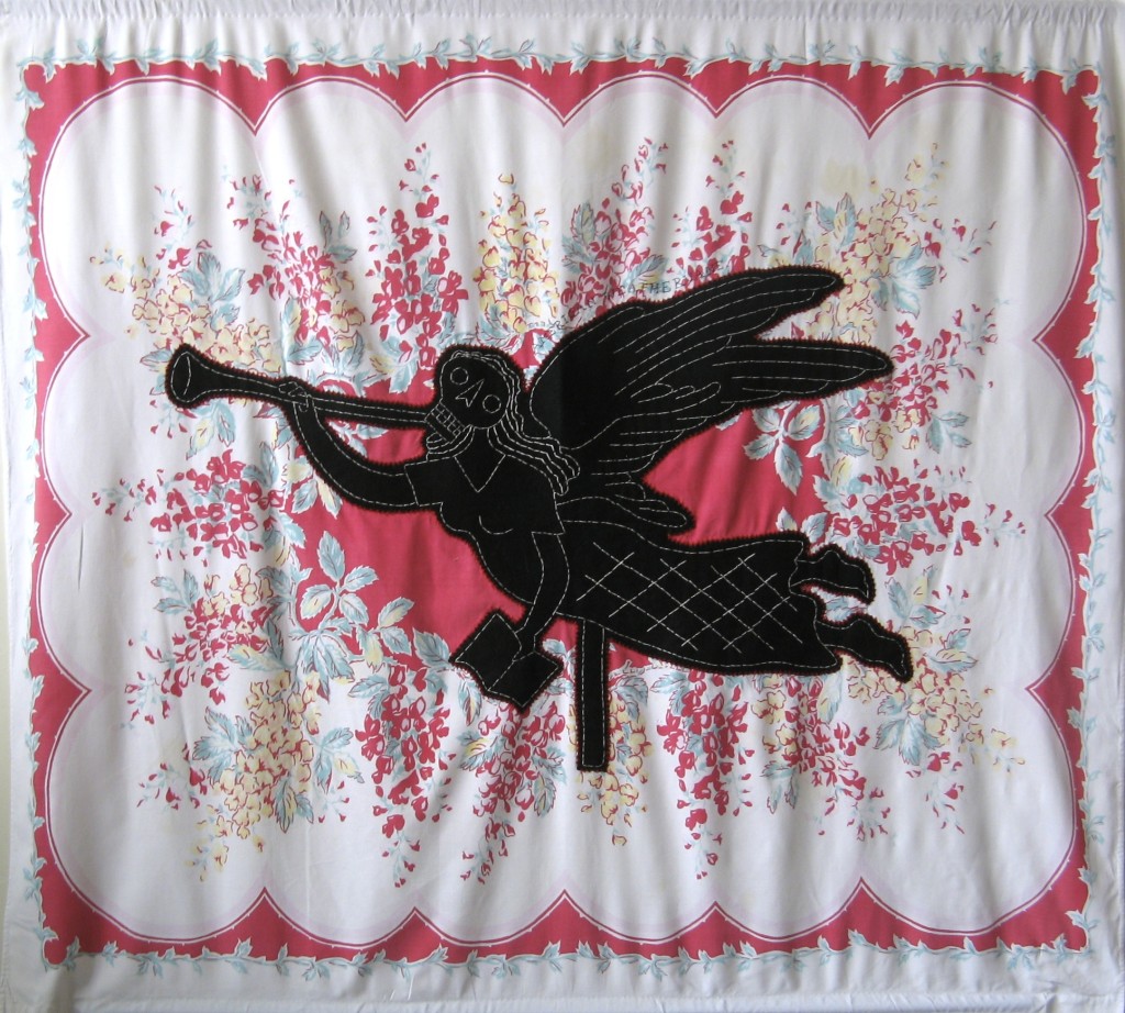 From the series American Memento Mori: Angel - applique and embroidery on vintage textile. A folk art weathervane of an angel in silhouette with a skeleton head is appliquéd onto a colorful vintage tablecloth, and embellished with white embroidery.